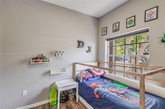 bedroom featuring hardwood / wood-style floors