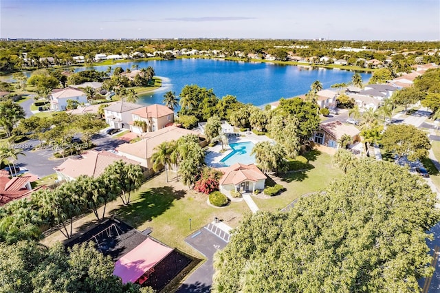 birds eye view of property featuring a water view