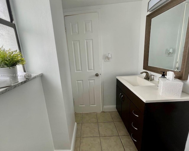 bathroom with vanity and tile patterned floors