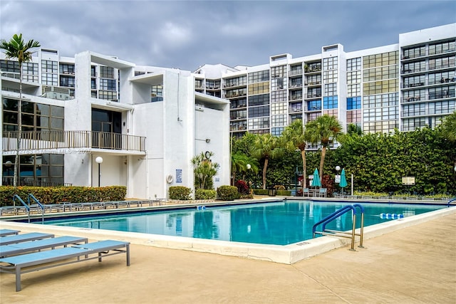 view of swimming pool featuring a patio