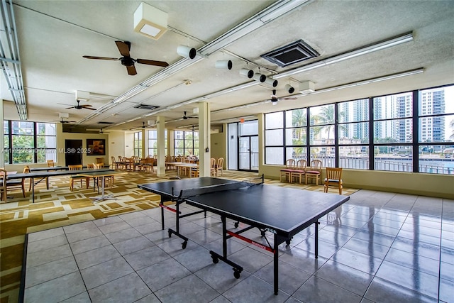 game room featuring tile patterned floors