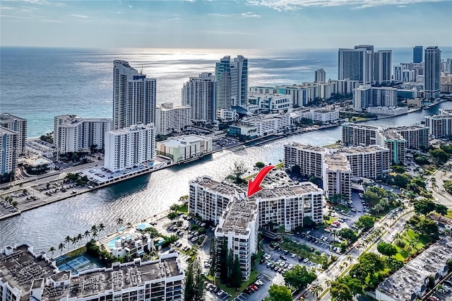 birds eye view of property featuring a water view