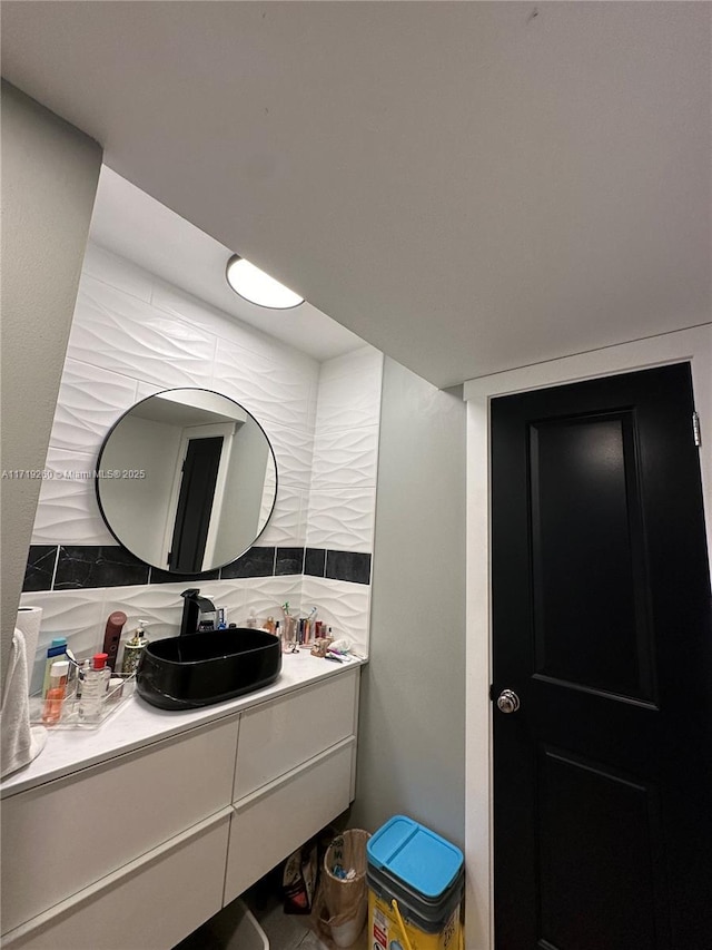 bathroom featuring backsplash and vanity