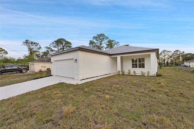 ranch-style home with a front lawn and a garage