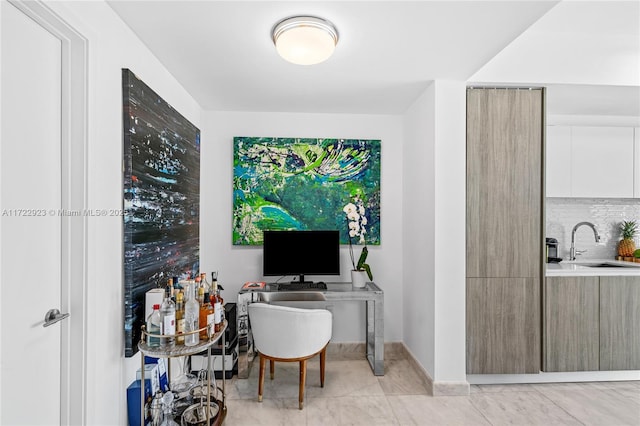 2900 NE 7th Ave Unit 908, Miami, FL 33137 - office with a sink and baseboards
