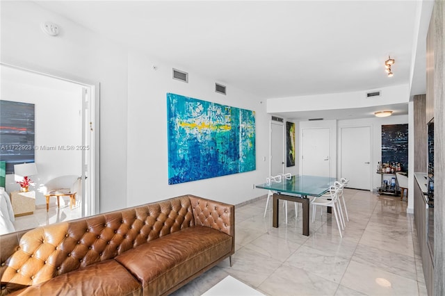 2900 NE 7th Ave Unit 908, Miami, FL 33137 - rec room with light marble finish flooring