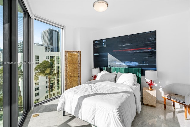 bedroom with expansive windows