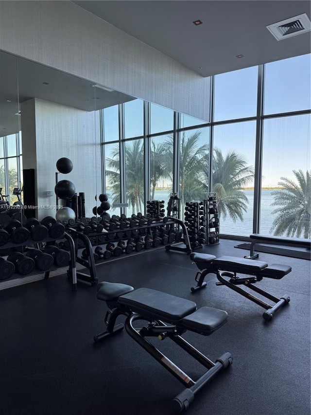 2900 NE 7th Ave Unit 908, Miami, FL 33137 - workout area with floor to ceiling windows and a water view
