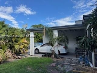 view of car parking with a carport