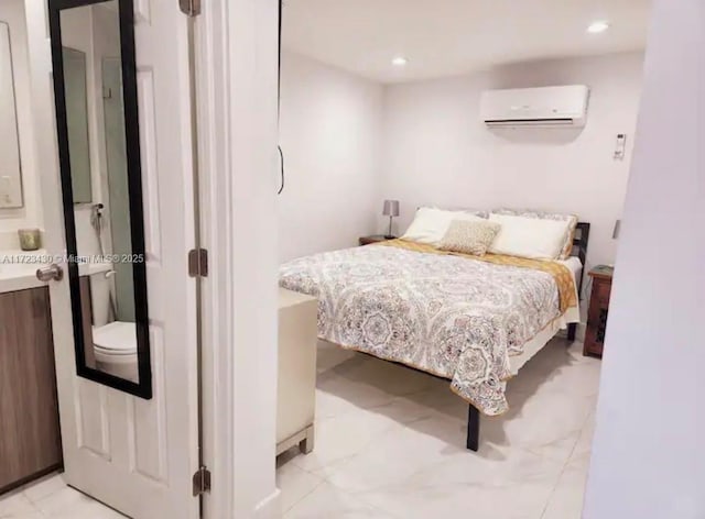 bedroom with a wall mounted air conditioner