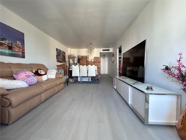 living room with light hardwood / wood-style flooring