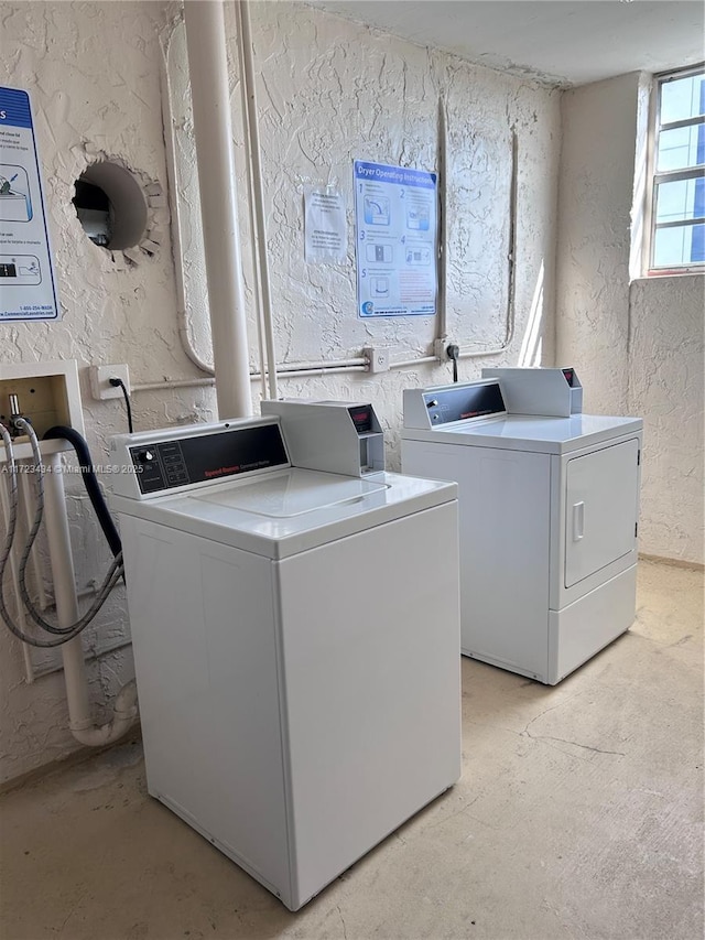 laundry area featuring washer and clothes dryer