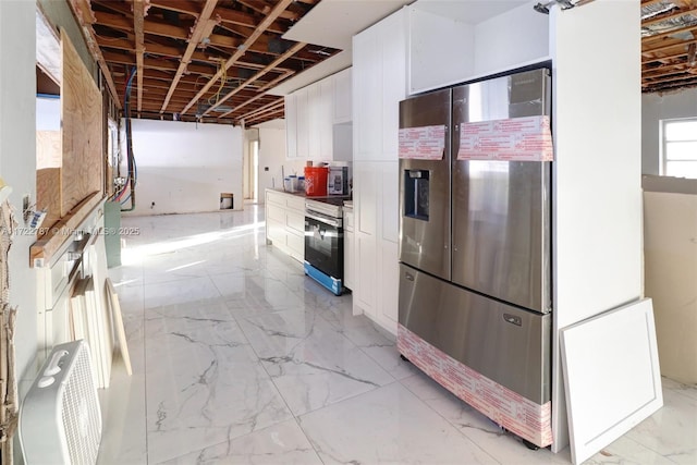 kitchen with white cabinetry and stainless steel appliances