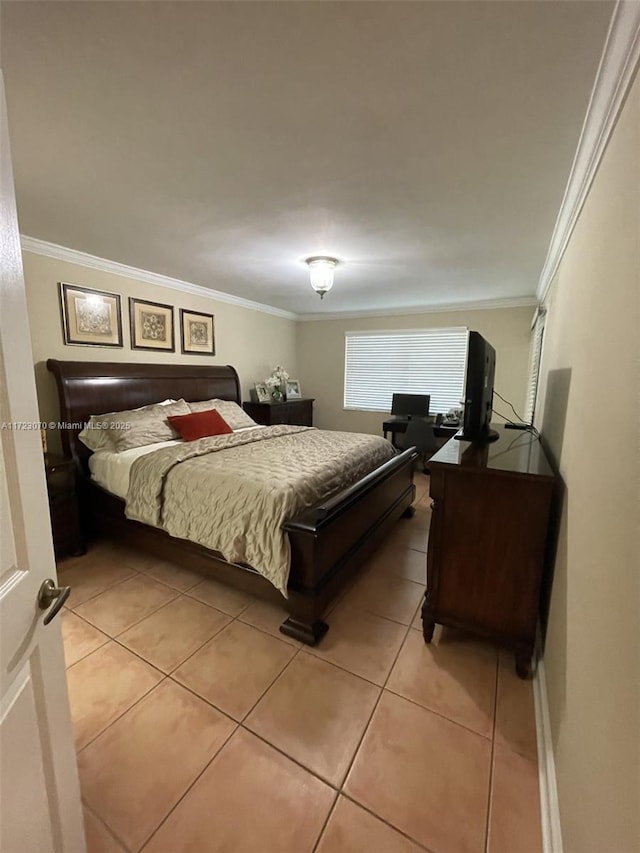 bedroom with crown molding and light tile patterned flooring