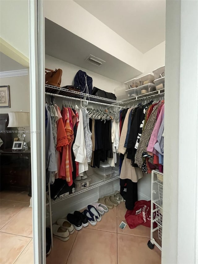 walk in closet featuring tile patterned floors