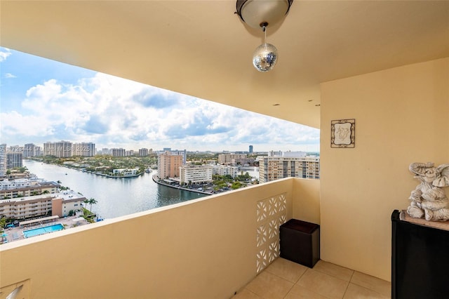 balcony featuring a water view