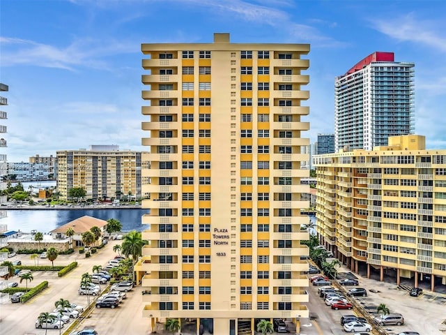 view of building exterior with a water view