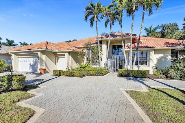 view of front of home with a garage