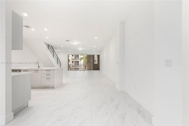 hallway featuring sink