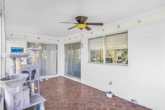 view of patio with ceiling fan