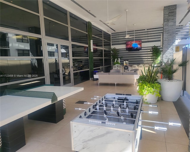 view of patio featuring ceiling fan