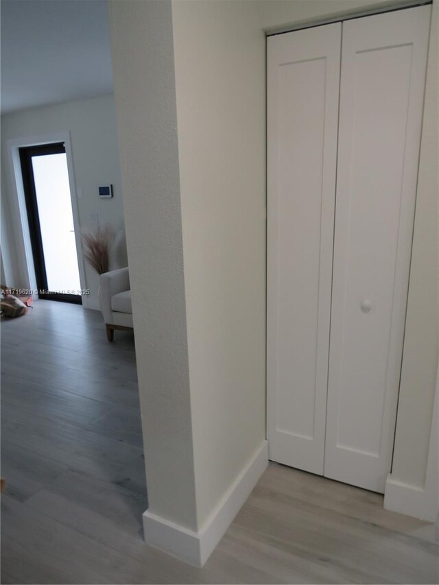 home theater room with light wood-type flooring