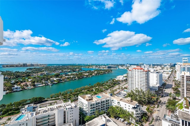 bird's eye view with a water view