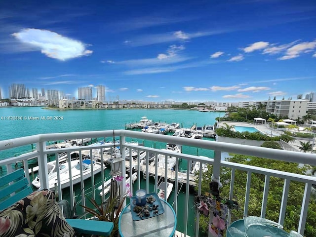 balcony featuring a water view