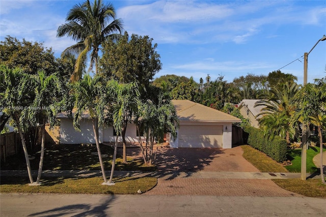 view of front of property with a garage