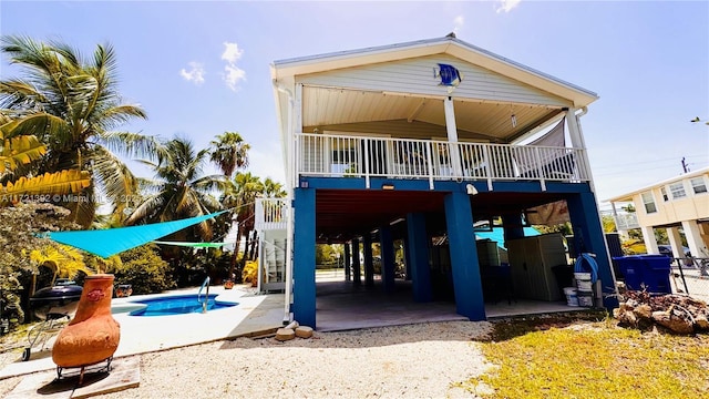 back of property with a patio