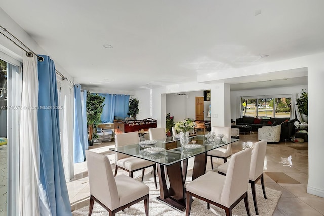 dining room with light tile patterned floors