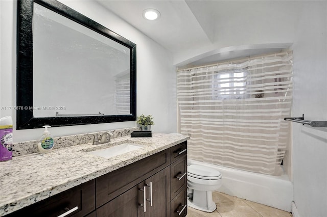 full bathroom featuring tile patterned flooring, vanity, toilet, and shower / bathtub combination with curtain