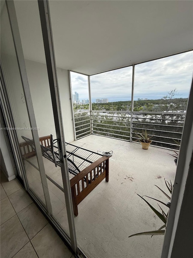 unfurnished bedroom featuring tile patterned floors and multiple windows