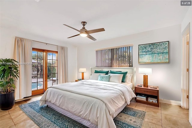 bedroom featuring access to exterior, light tile patterned floors, a ceiling fan, and baseboards