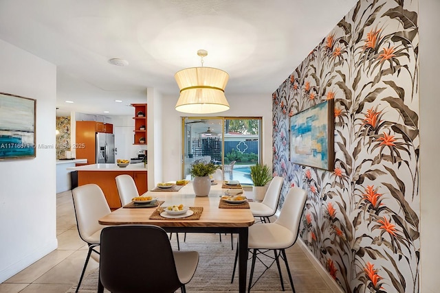 dining space with light tile patterned flooring, recessed lighting, and baseboards