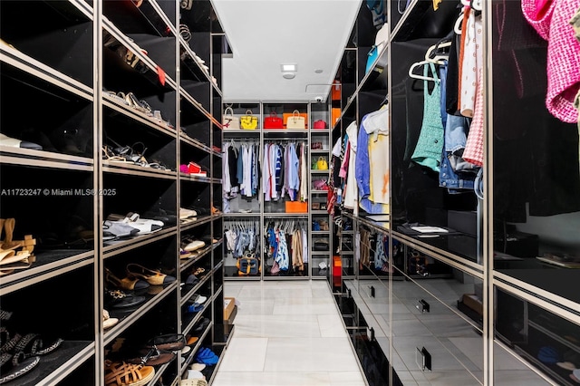 walk in closet featuring tile patterned floors