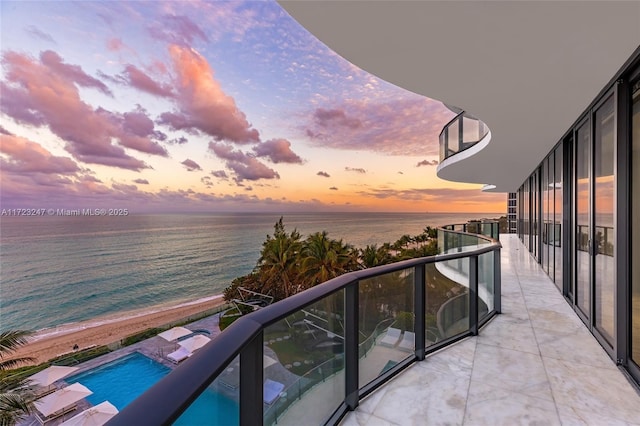 balcony at dusk with a water view