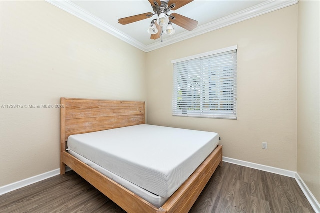 bedroom with dark hardwood / wood-style flooring, crown molding, and ceiling fan