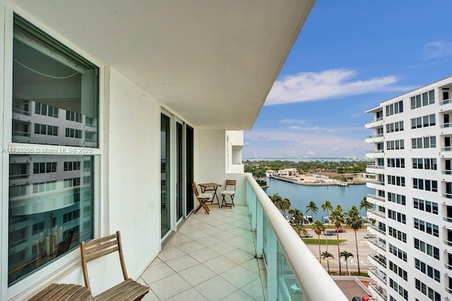 balcony featuring a water view