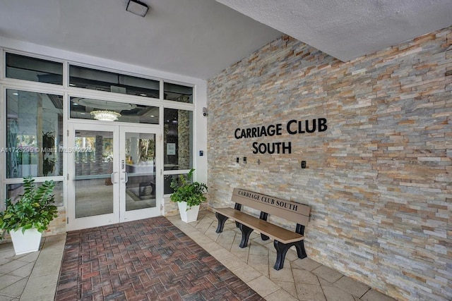 entrance to property featuring french doors