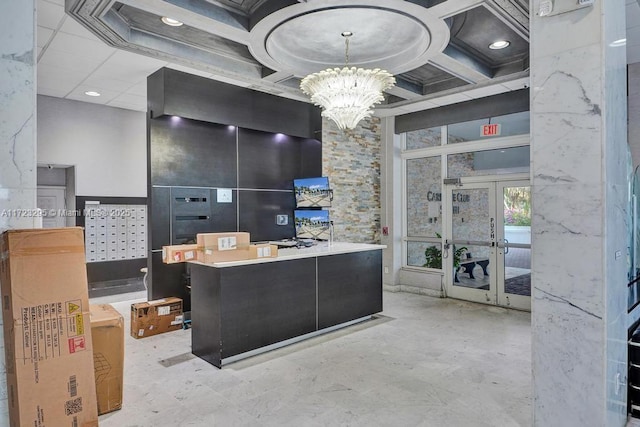 office space featuring coffered ceiling, french doors, and a chandelier