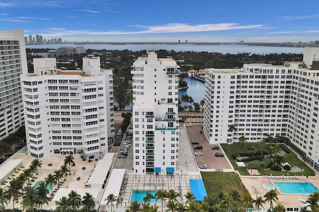 birds eye view of property featuring a water view