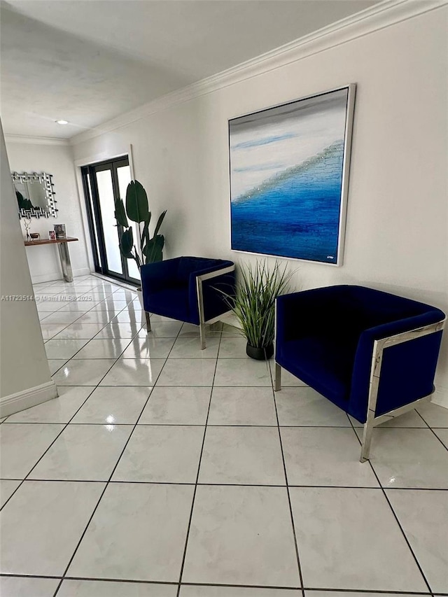 interior space with tile patterned floors and crown molding