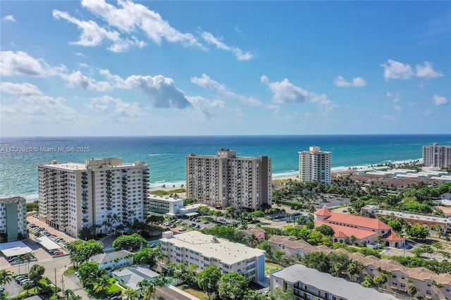 aerial view featuring a water view and a view of the beach