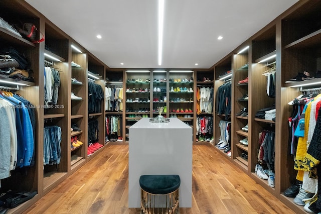 walk in closet featuring light wood-type flooring