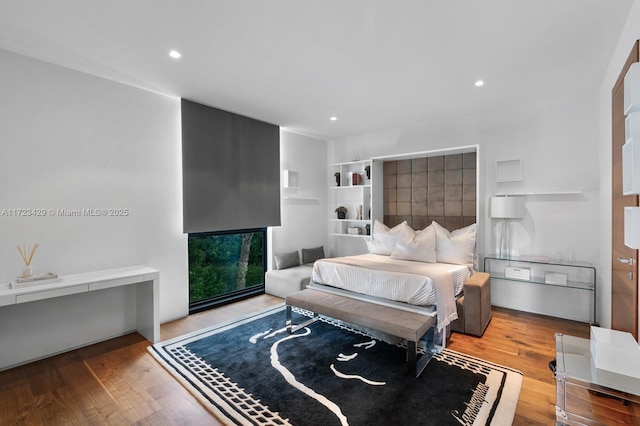 bedroom featuring light wood-type flooring