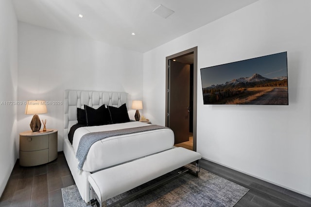 bedroom featuring dark hardwood / wood-style floors