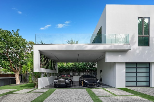 view of car parking featuring a carport