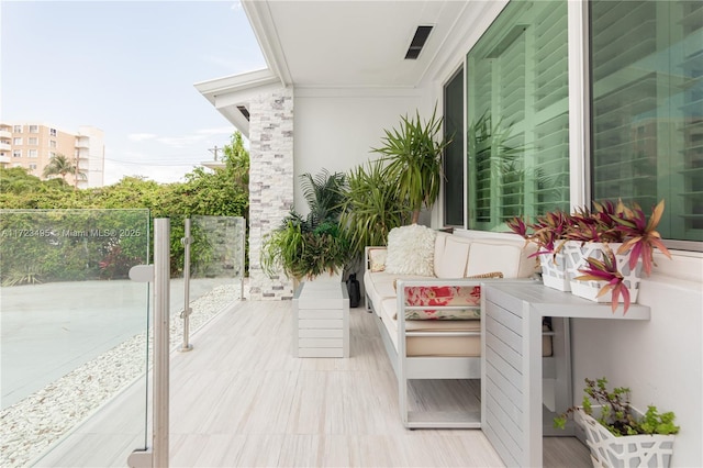 balcony featuring an outdoor living space