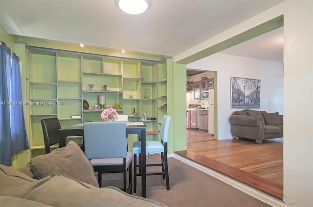 dining area featuring hardwood / wood-style flooring